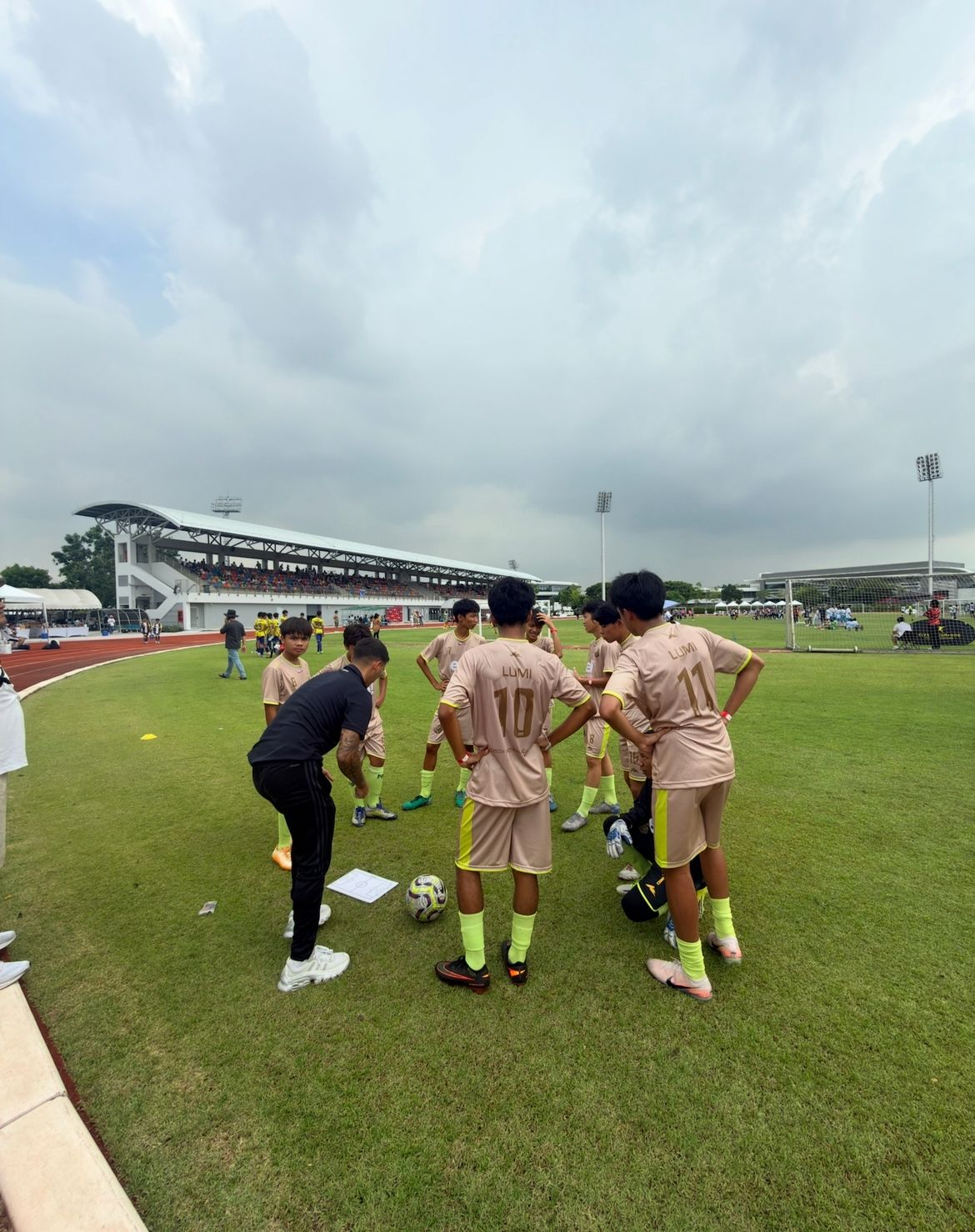 Marek with the LUMI team on the pitch during a tournament